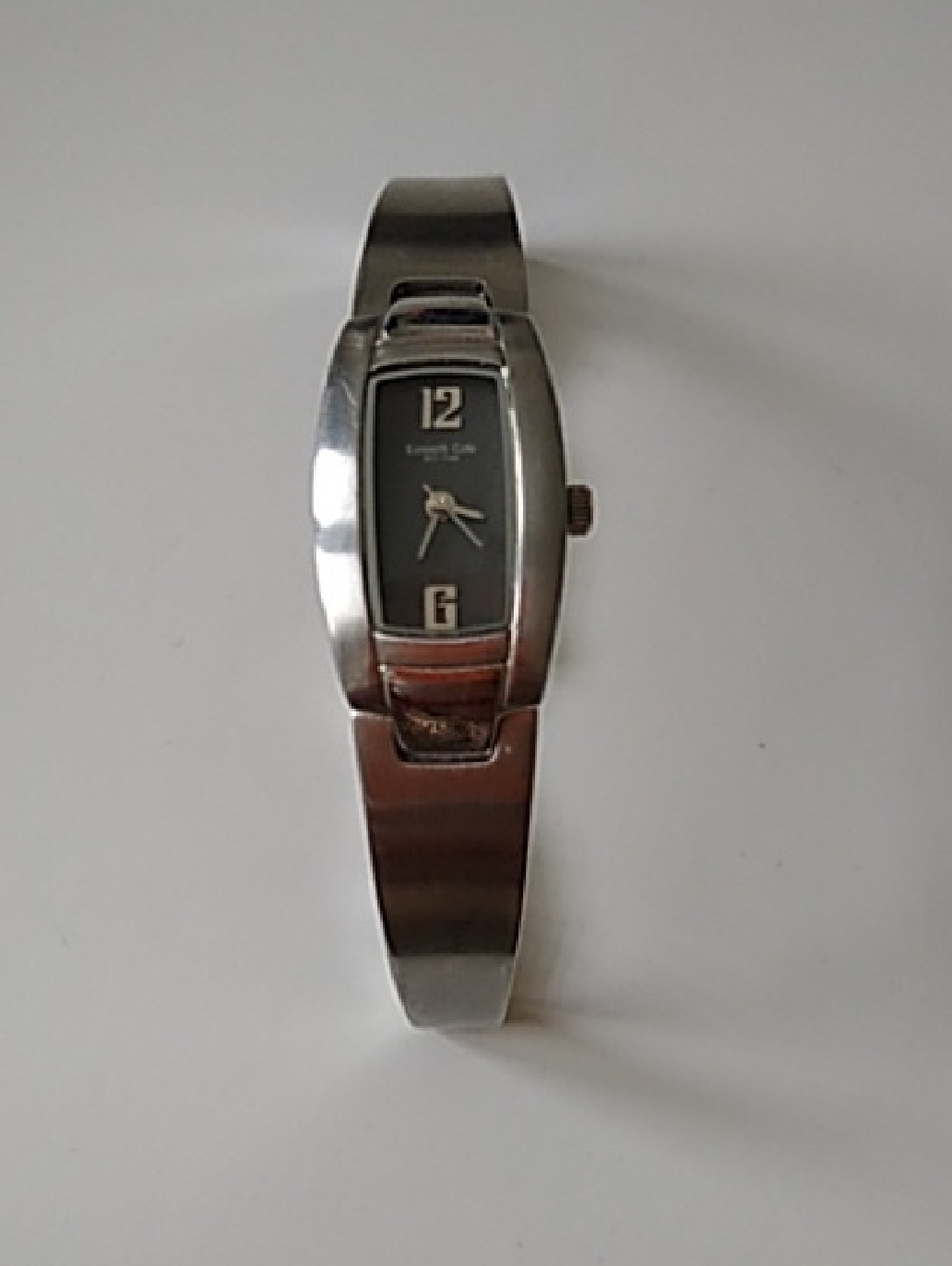 Kenneth Cole Silver Bangle Watch with Black Dial